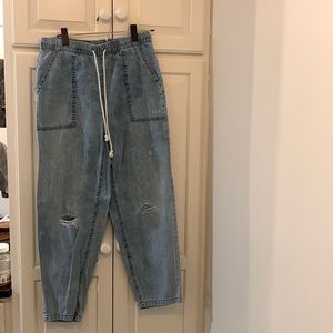 Aerie relaxed fit distressed denim pants.